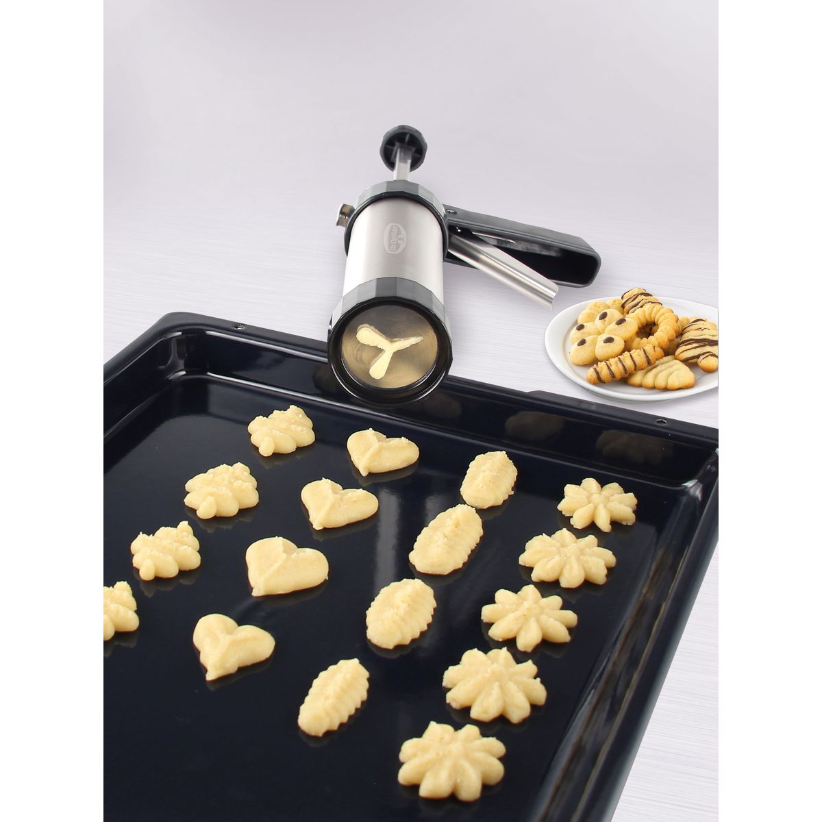 Presse-biscuit et 12 disques de motif Dr Oetker